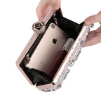 The Penelope Clutch Bag